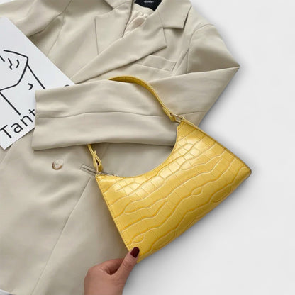 Nora. Glänzende Lederhandtasche